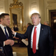 Former Trump advisor Steve Bannon, Musk, and former President Trump, hanging out at a White House policy and strategy forum in February 2017.